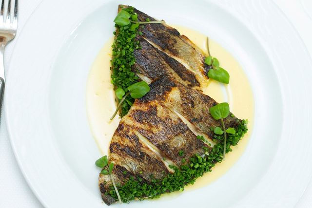 Wood-grilled fish at Sails Restaurant